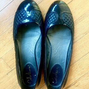Cole Haan black quilted flats with Nike Air soles